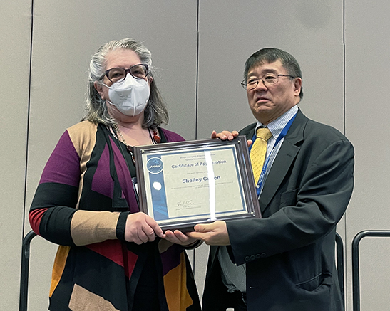 JANNAF Senior Meeting Planner, Shelley S. Cohen, accepted the TEC Certificate of Appreciation from JANNAF TEC Chair, Frank Tse.