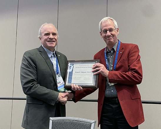 January 2026 JANNAF Meeting Chair, Robert Baurle, PhD, presented the APS Lifetime Achievement Award to Dean R. Eklund, PhD.